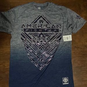 Brand new American fighter shirt,with tags! Size Xl . Blue color .